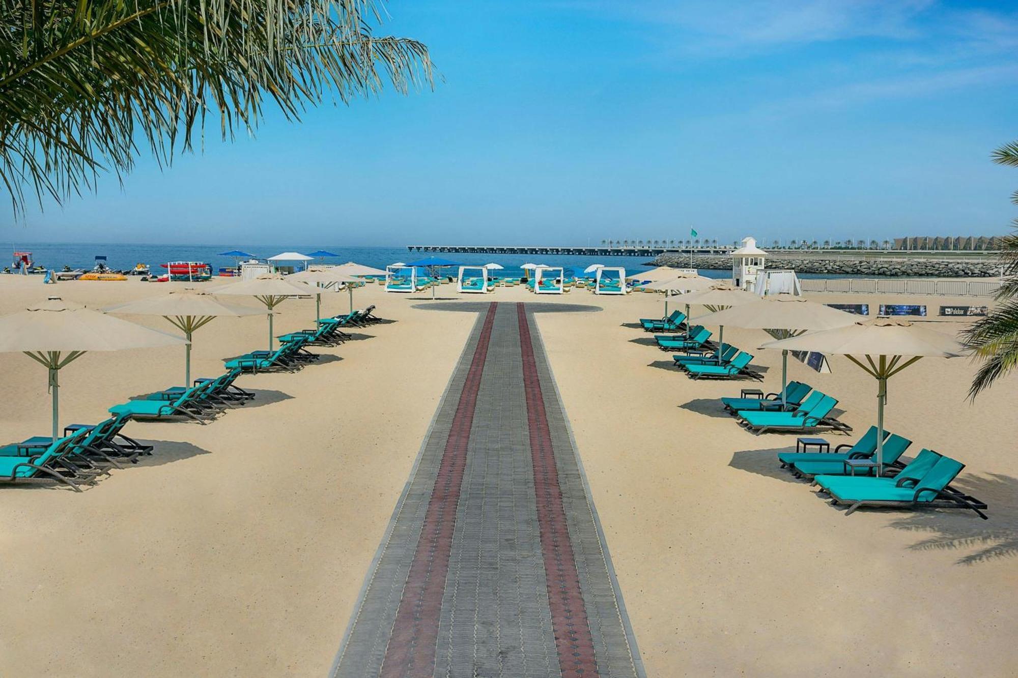 Al Habtoor Grand Resort, Autograph Collection Dubai Bagian luar foto The beach at the InterContinental Hotel