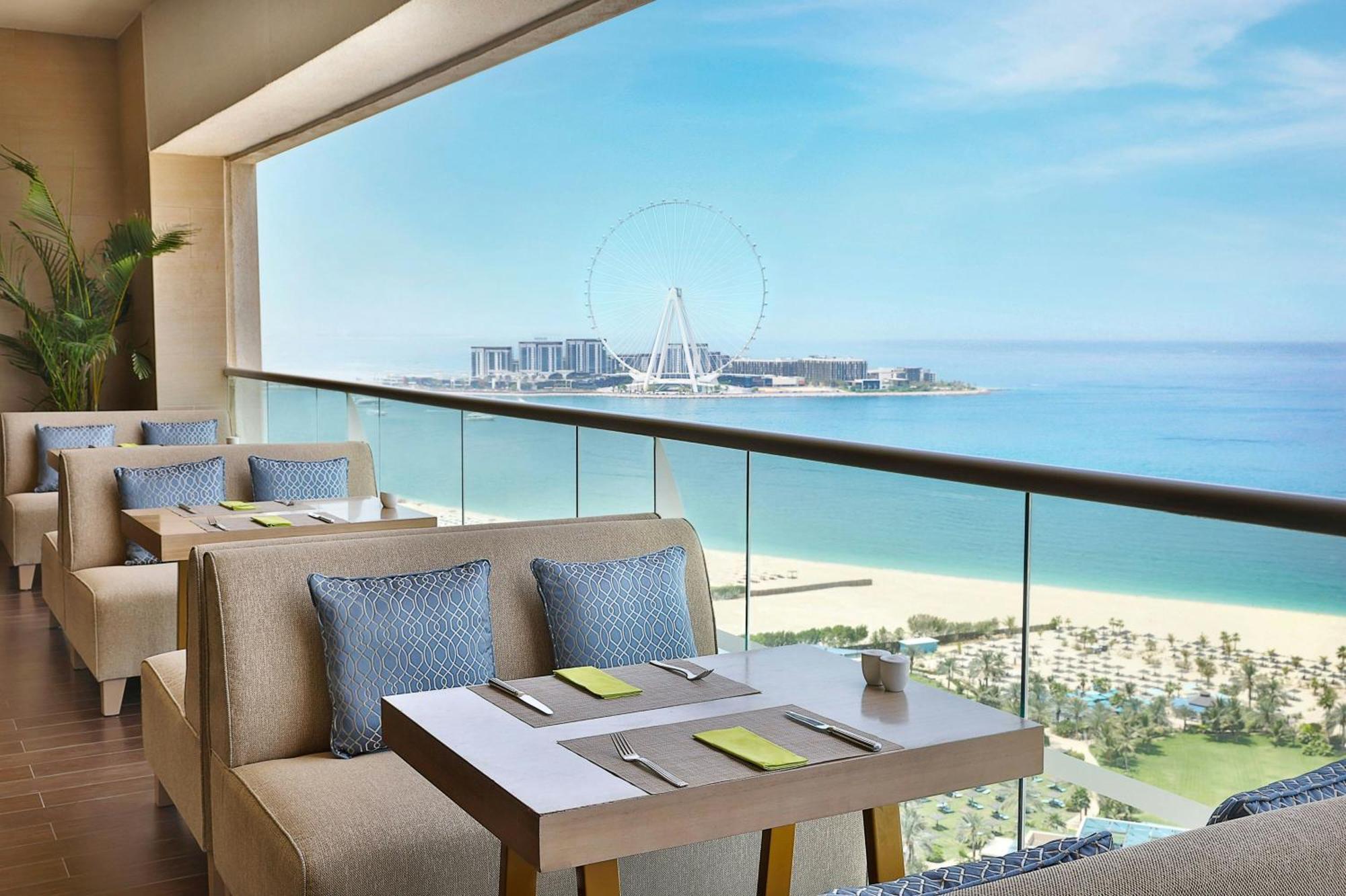 Al Habtoor Grand Resort, Autograph Collection Dubai Bagian luar foto View of the Palm Jumeirah from the Westin